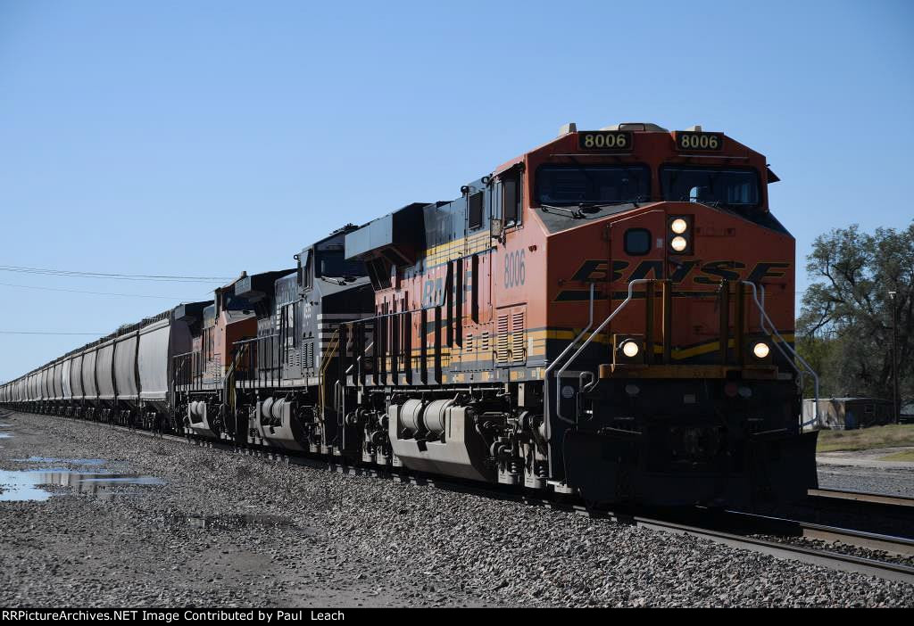 Grain train rolls east